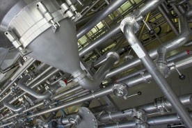 an industrial, stainless steel piping system