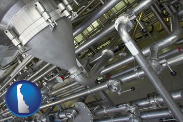 an industrial, stainless steel piping system - with Delaware icon